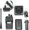 Set met Alinco Walkie-Talkie: Oplader, netadapter, antenne, riemclip, accubehuizing en draagbare zendontvanger.