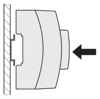 Doorsnede van een mechanisch onderdeel dat met een pijl in de pijlrichting moet worden bewogen.