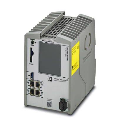 Grijs-geel elektronisch besturingsapparaat met ventilatiesleuven en meerdere aansluitingen aan de voorkant, waaronder Ethernet-poorten.