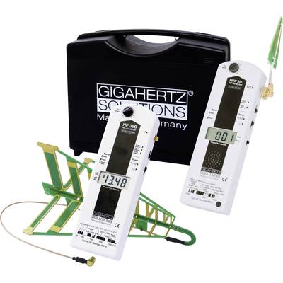 Draagtas met twee witte EMF-meetapparatuur en antennes. Apparaten tonen digitale displays en schakelaars voor frequentiemetingen.