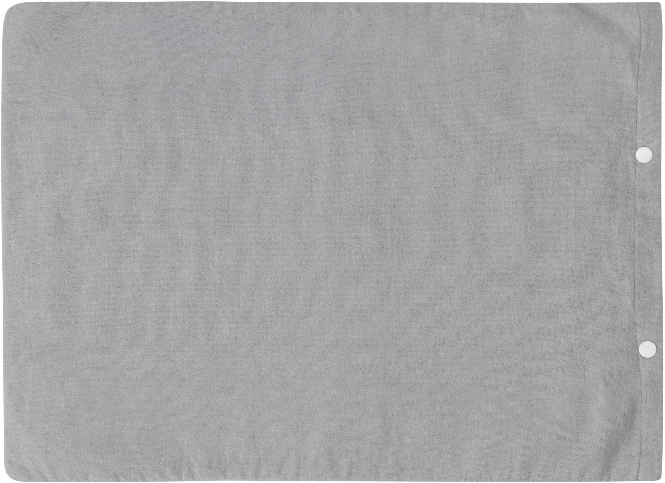 Grijs rechthoekig handdoek met een gladde oppervlakte en afgeronde hoeken, twee drukknopen aan de rechterzijde.