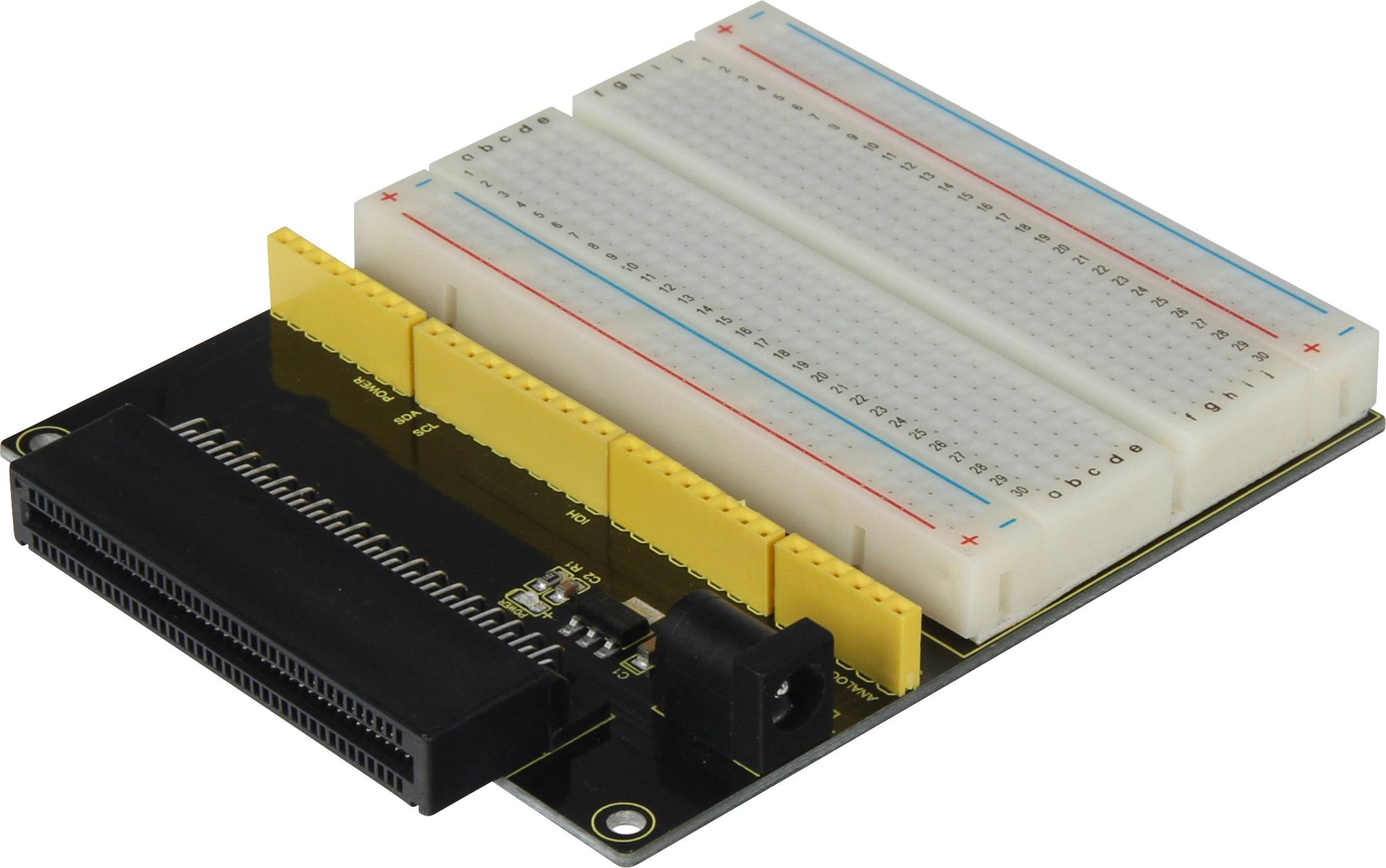'Een breadboard met gele aansluitrails voor elektronische componenten en zwarte aansluitplaatsen voor extra verbindingen.'