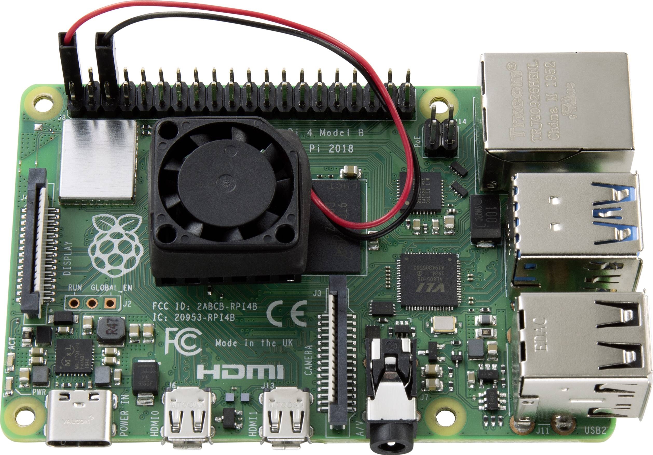 Een groen Raspberry Pi-bord met USB-poorten, HDMI-uitgang en een klein koelventilator, geschikt voor elektronische projecten.