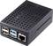 Zwart, geventileerd behuizing van een mini-computer met meerdere USB-poorten en een Ethernet-poort aan de voorkant.