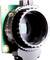 Camera-module gemonteerd met zwart lensbehuizing op groen printbord.