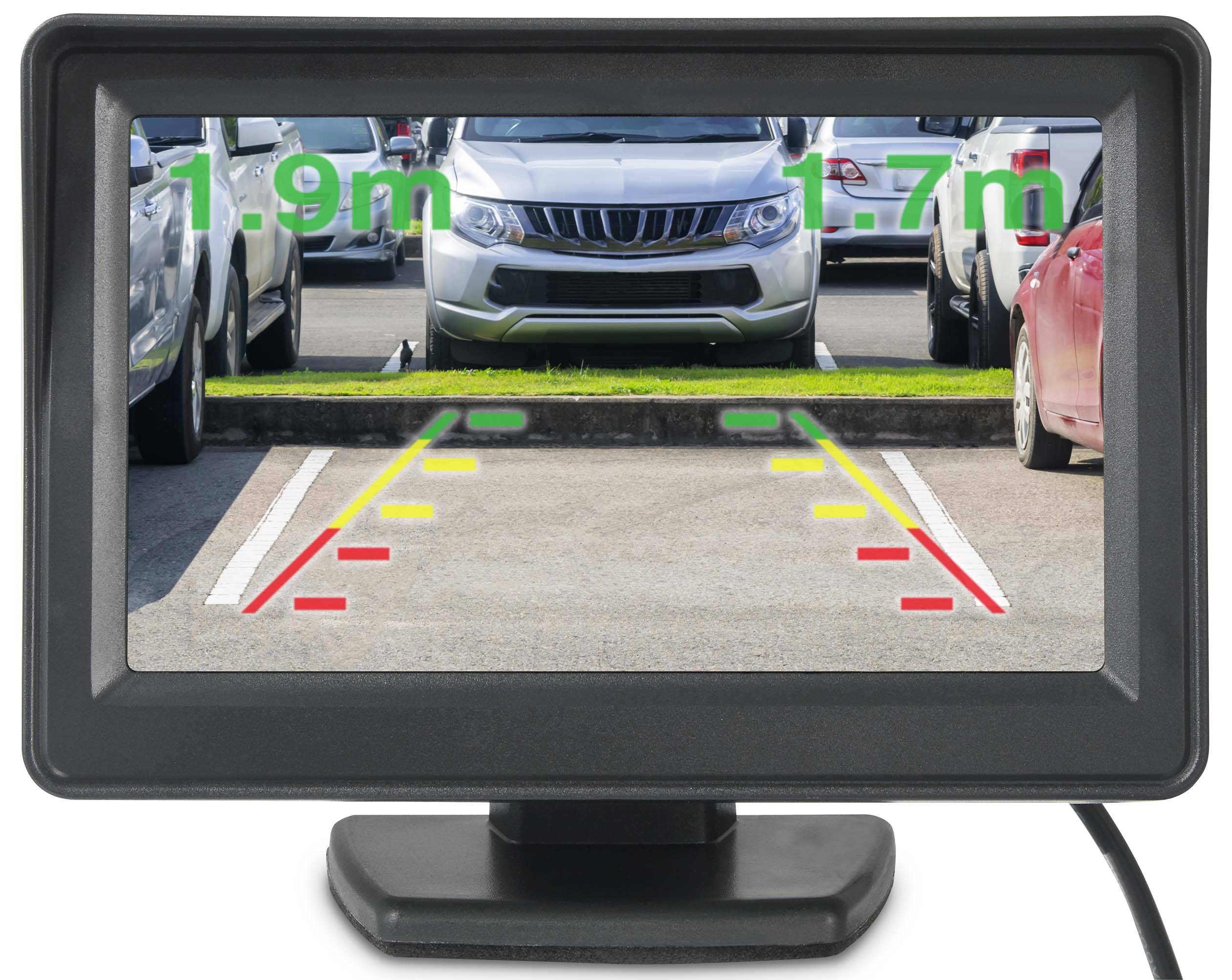 'Achteruitrijcamera-scherm toont een parkeerplaats met groene, gele en rode afstandsindicatie en afstandsmeting van 1,9m en 1,7m.'