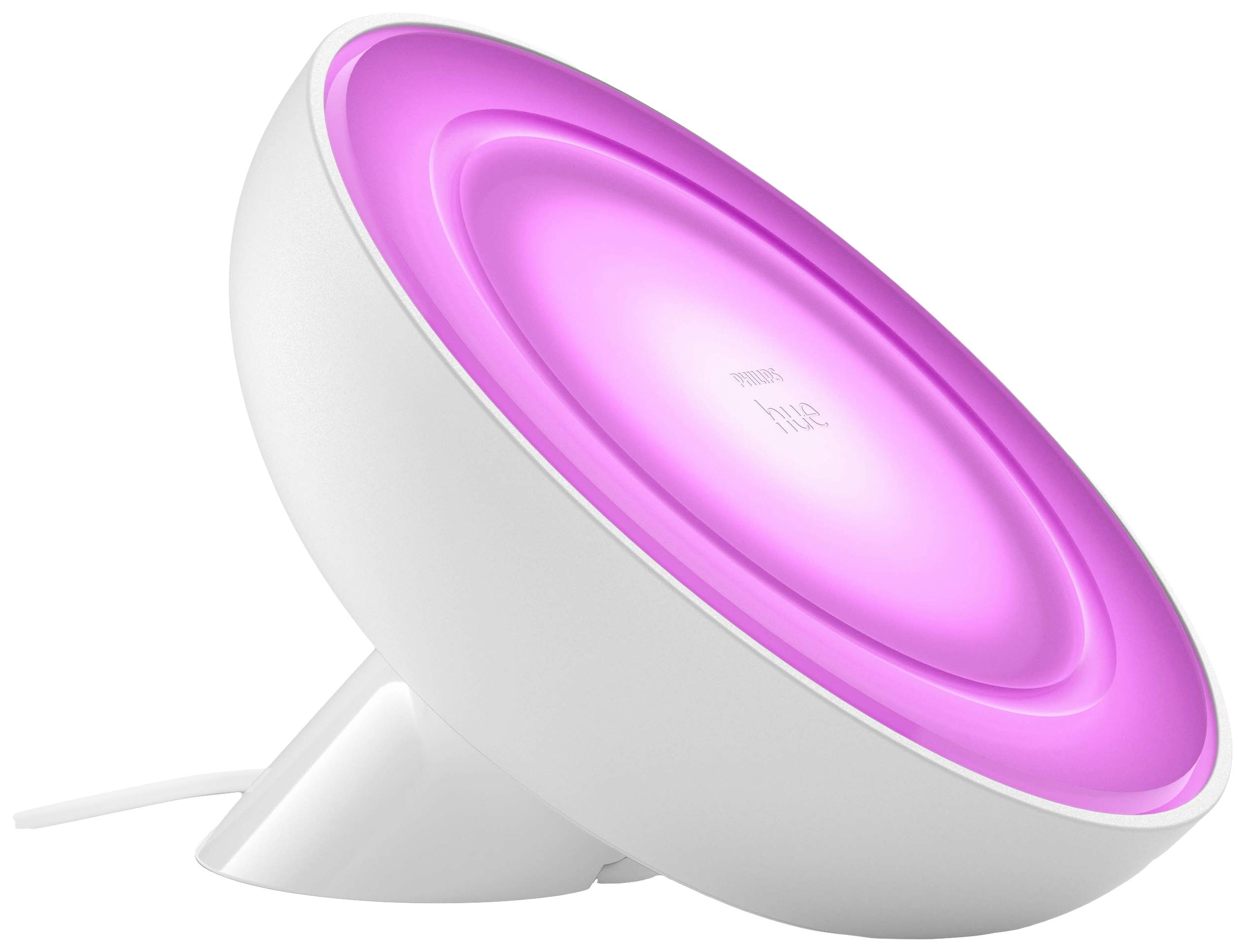 Witte, ronde tafellamp straalt roze licht uit.