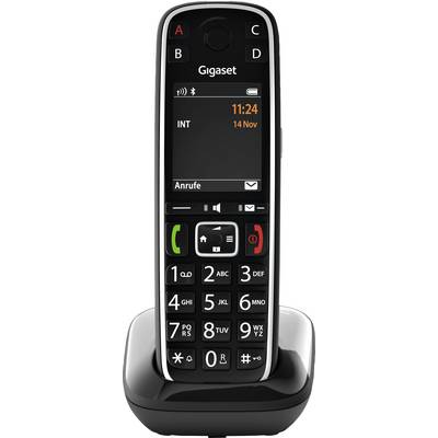 Draadloze telefoon met groot display op laadstation. Het display toont de tijd 11:24 en de datum 14 november. Toetsen voor nummers en functies eronder.