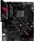 Zwart ASUS-moederbord met RGB-verlichting; CPU-socket, RAM-sleuven en andere hardware-aansluitingen zichtbaar.