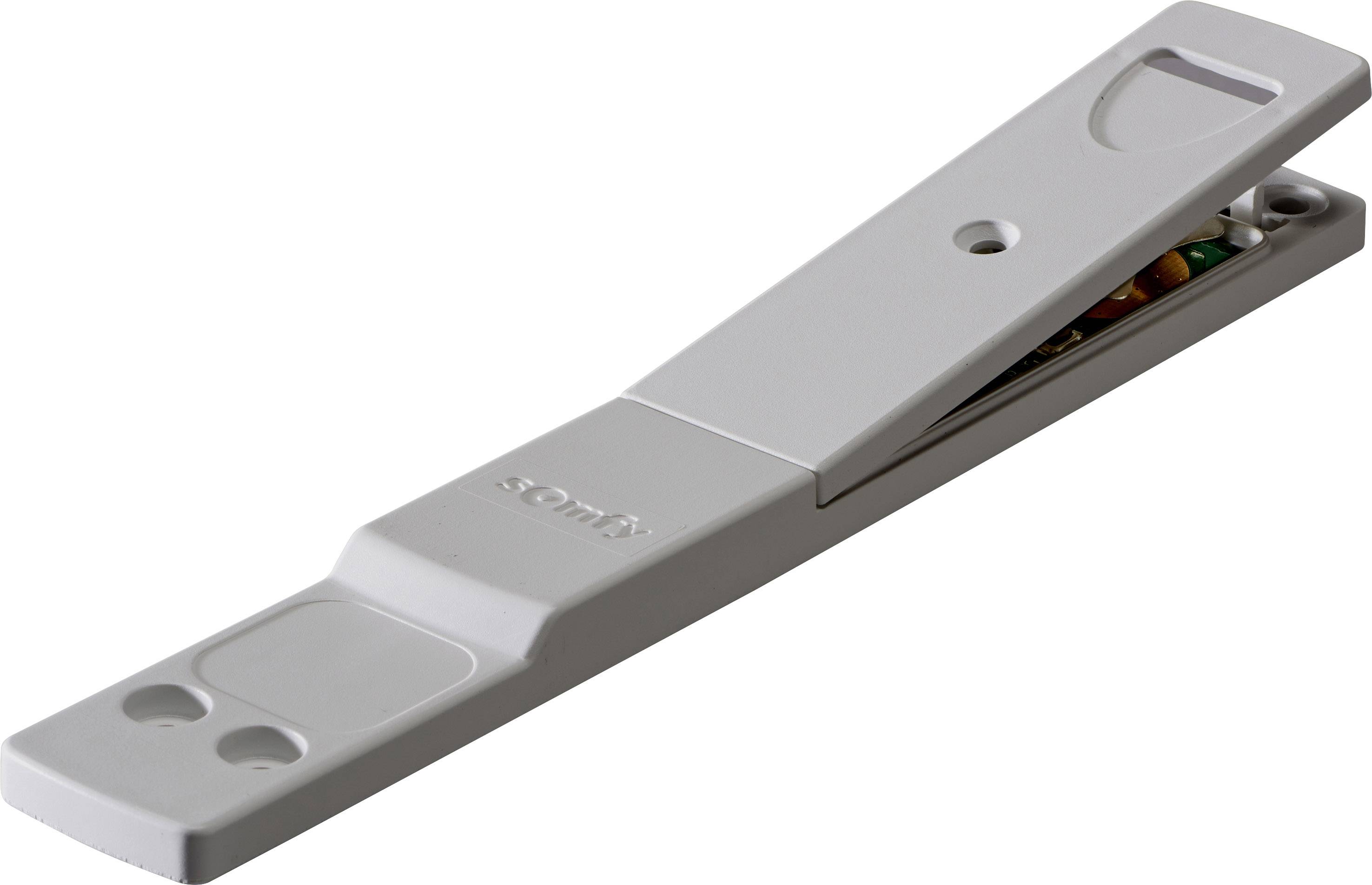 Een witte, langwerpige magnetsensor met een open behuizing die interne componenten blootlegt.