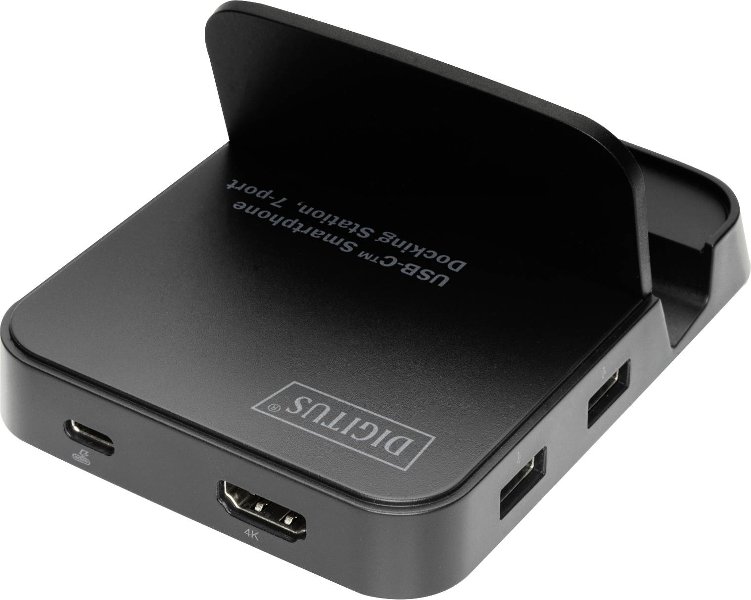 Een zwarte dockingstation met meerdere aansluitingen, waaronder USB-C, HDMI en USB-A, voor smartphoneverbinding.