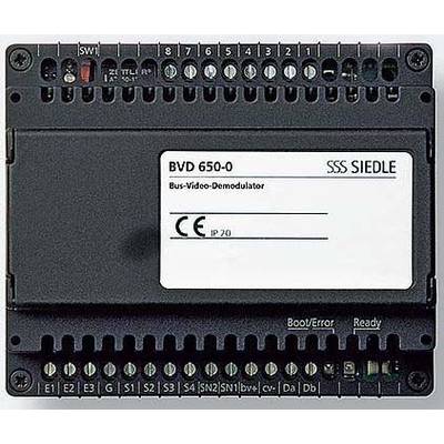 Bus-video-demodulator van SSS Siedle met modelnummer BVD 650-0, afgebeeld voor een achtergrond van aansluitingen en schakelaars.