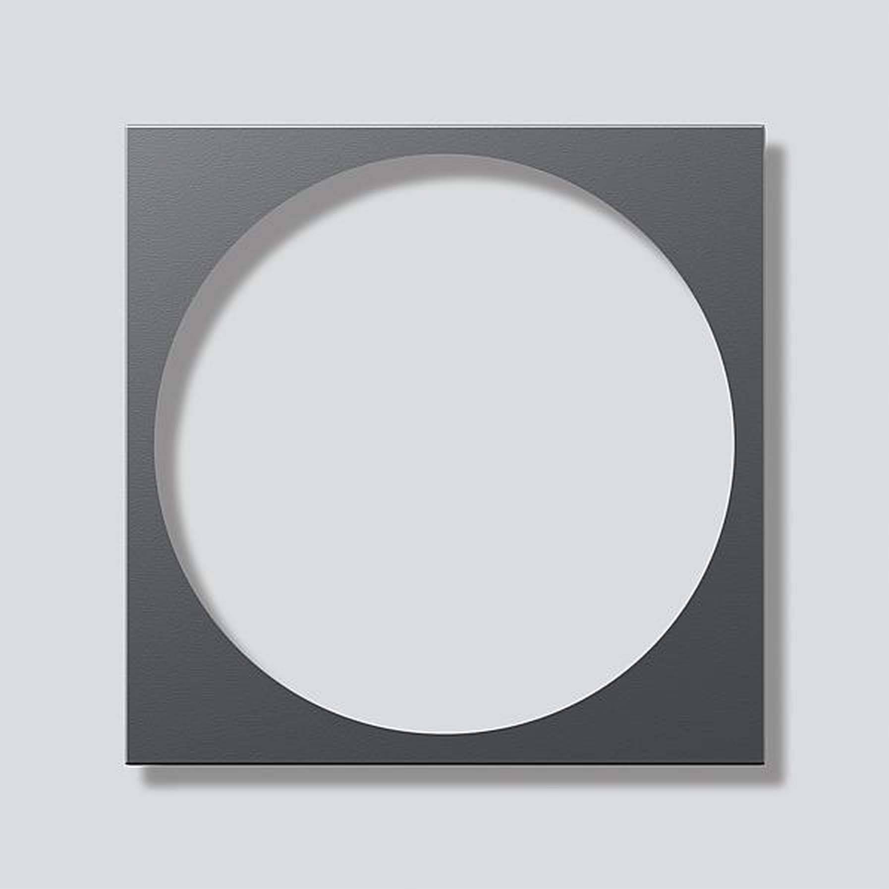 Een grijze vierkante lijst met een rond uitgesneden cirkel in het midden op een lichtgrijze achtergrond.
