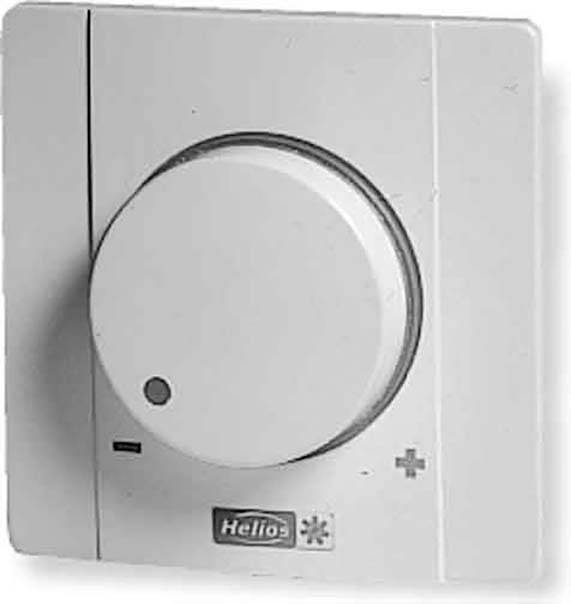 Een ronde draaiknop op een wit bedieningspaneel, vermoedelijk voor temperatuur- of ventilatiebediening, met '+' en '-' markeringen.