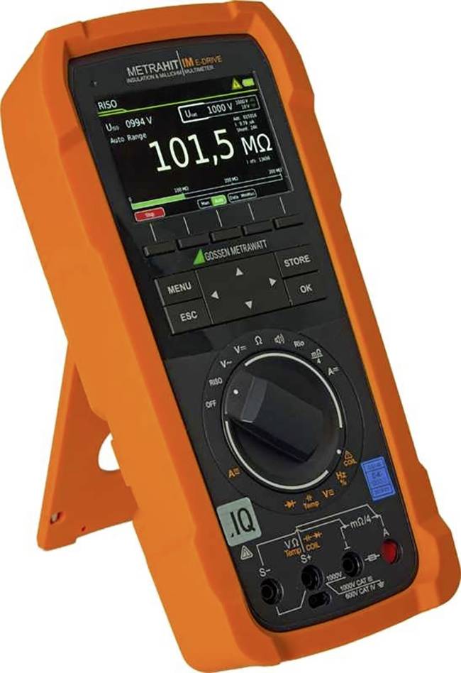 Een oranje multimeter toont een meting van 101,5 MΩ. Het heeft bedieningsknoppen en een draaibare keuzeschakelaar.