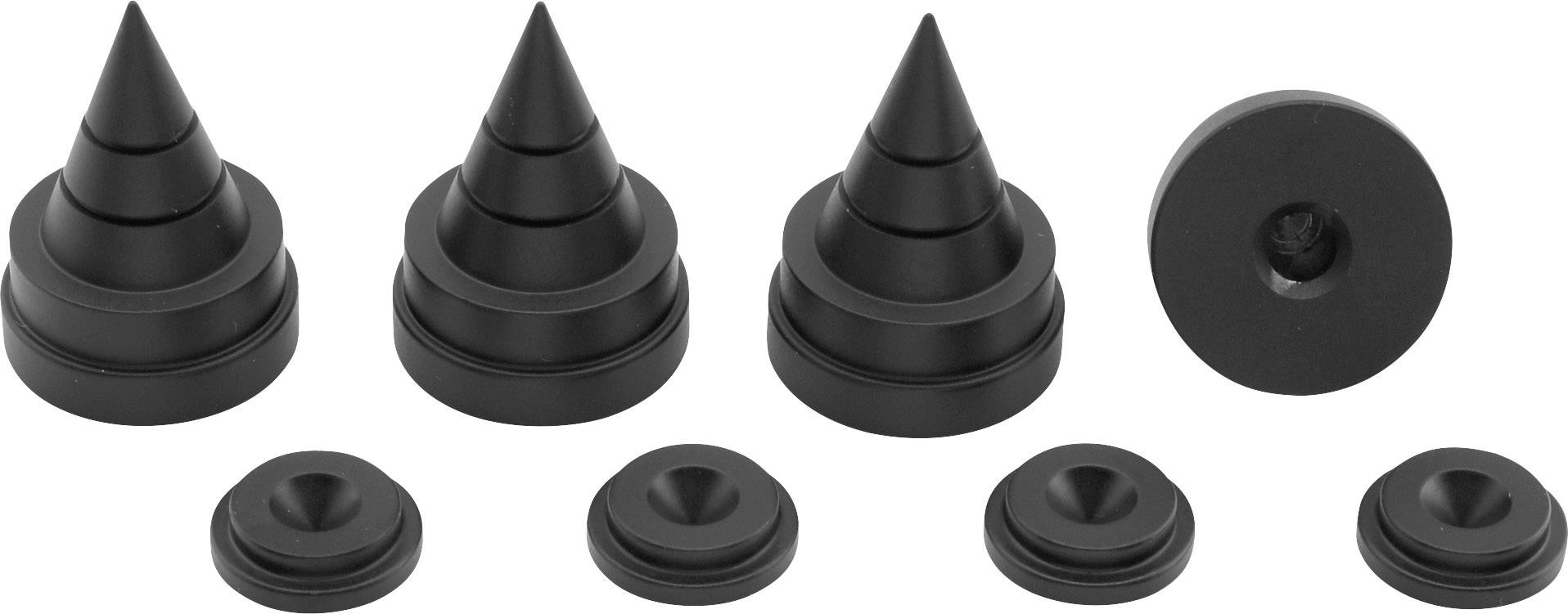 Vier zwarte kegelvormige spikes met een platte basis en vier bijpassende tegenstukken voor trillingdemping van audioapparatuur.