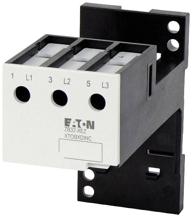 Een zwart en wit elektrisch aansluitingsmodule met drie aansluitingen, gemarkeerd als L1, L2, L3, gemonteerd op een houder.