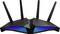 Zwarte wifi-router met vier antennes en oplichtende blauwe en paarse lichten voor verbeterde netwerkprestaties.