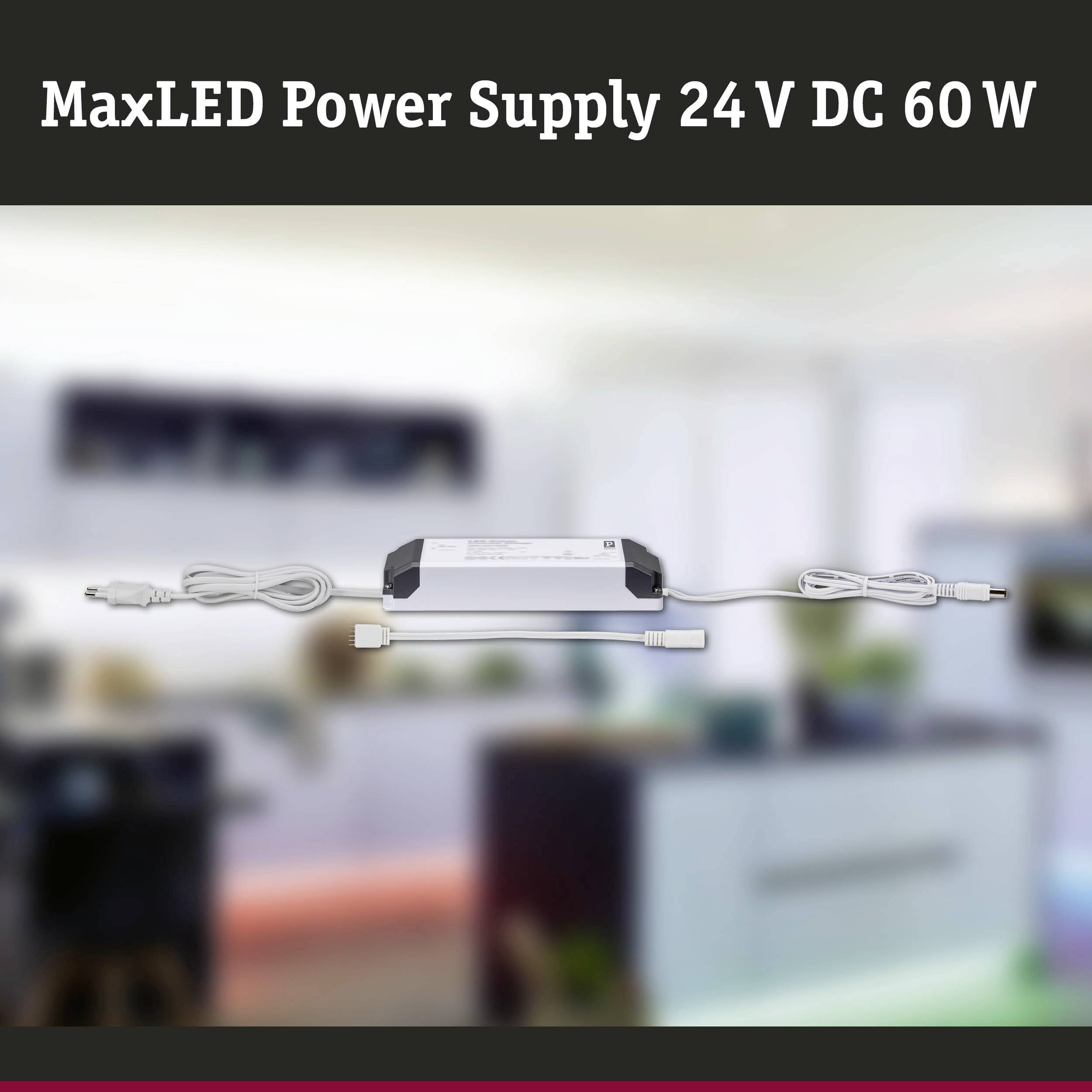 De afbeelding toont een MaxLED-voeding met 24 V DC en 60 W, geplaatst op de voorgrond voor een onscherpe achtergrond.