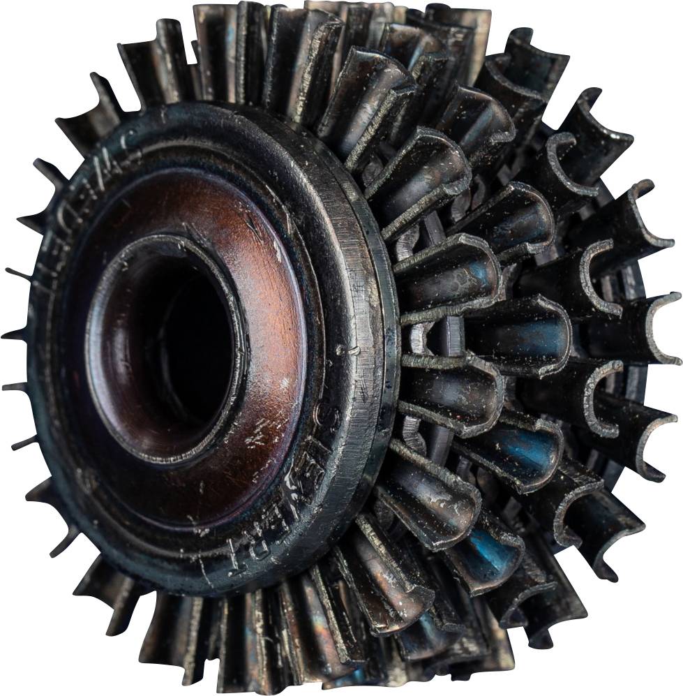 Een gedetailleerd beeld van een industrieel tandwiel met meerdere concentrische cirkels en tanden die dicht bij elkaar liggen.