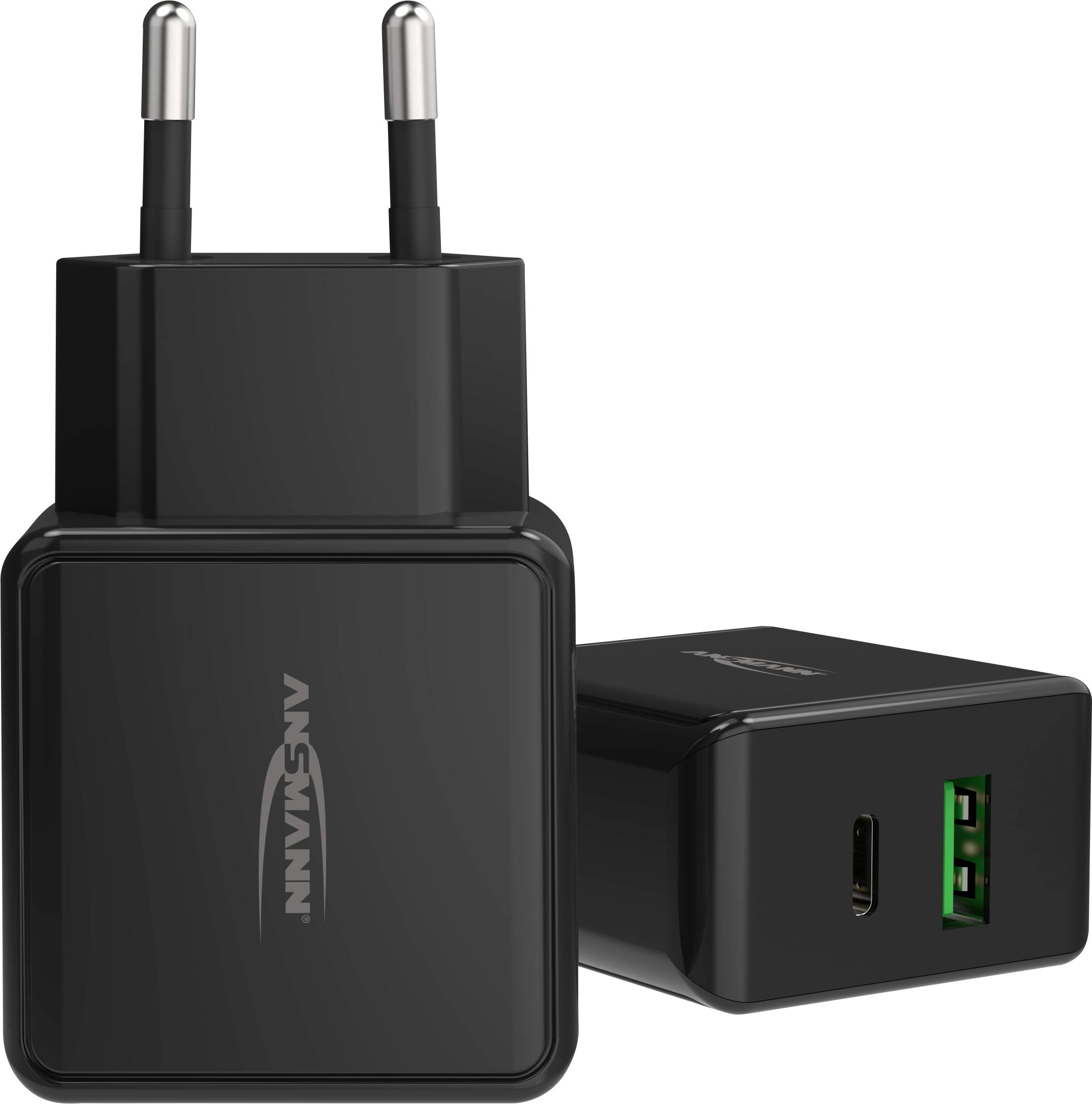 Een zwarte USB-oplader met twee stopcontacten, die zowel standaard- als USB-C-aansluitingen biedt.