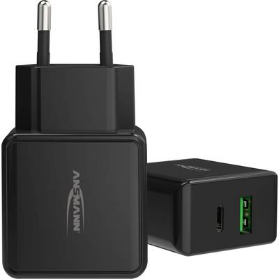 Een zwarte USB-oplader met twee stopcontacten, die zowel standaard- als USB-C-aansluitingen biedt.