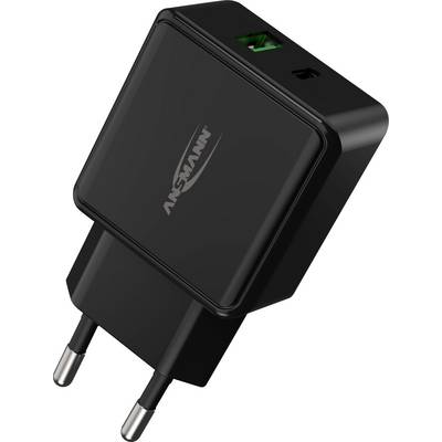Zwart USB-oplader met twee stekkerpennen en een USB-poort in groene kleur, zonder zichtbare merk- of modelspecificaties.