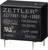 Zwart relais met opschrift 'Zettler AZ7709T-1AE-12DEF', elektrische specificaties en certificeringslogo's op het oppervlak.