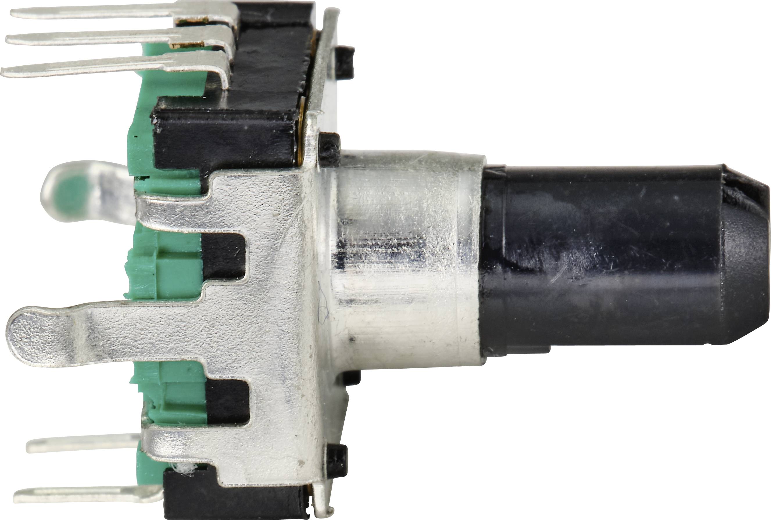 Close-up van een elektrische schakelaar met een groen behuizing en een zwarte schakelknop; toont de metalen pinnen voor aansluiting.