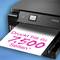 Een printer met een vel papier waarop staat: 'Drukt tot 7.500 pagina's*'.
