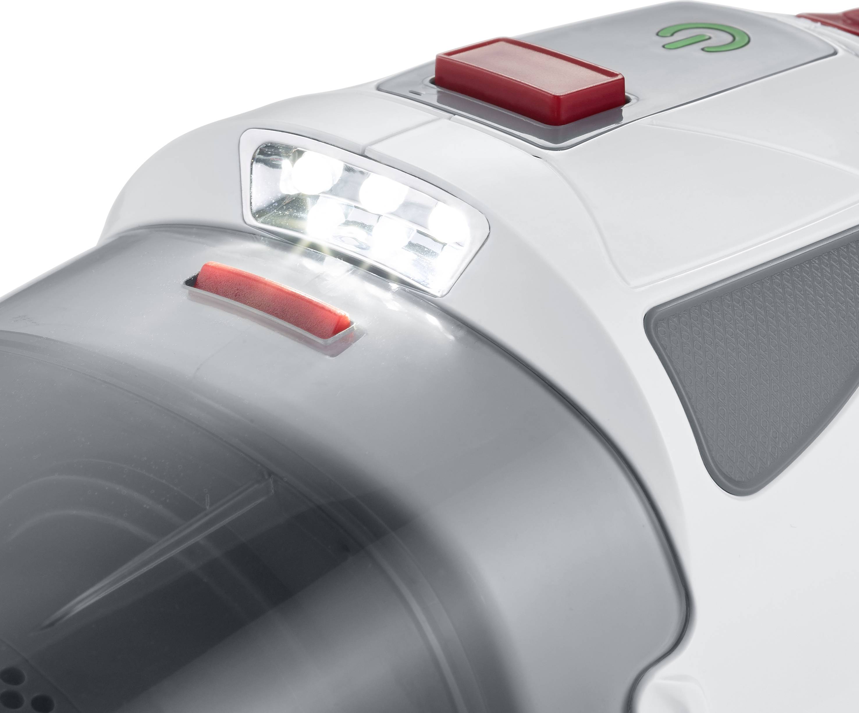 Een witte handstofzuiger met een LED-lamp aan de voorkant en twee rode schakelaars.
