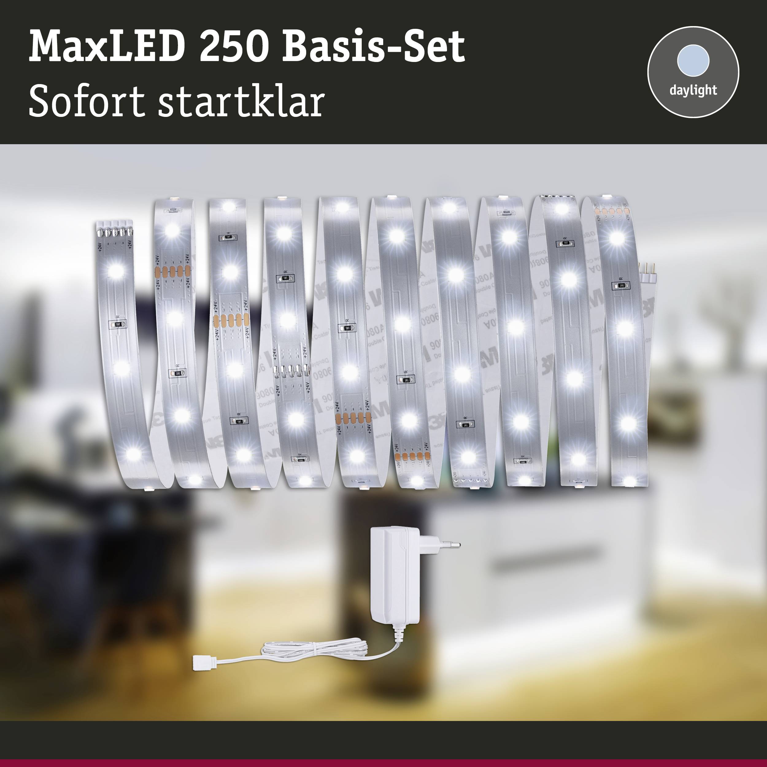 MaxLED 250 Basisset: Bevat LED-strip en voeding. Direct klaar voor gebruik. Achtergrond toont onscherpe woonruimte.