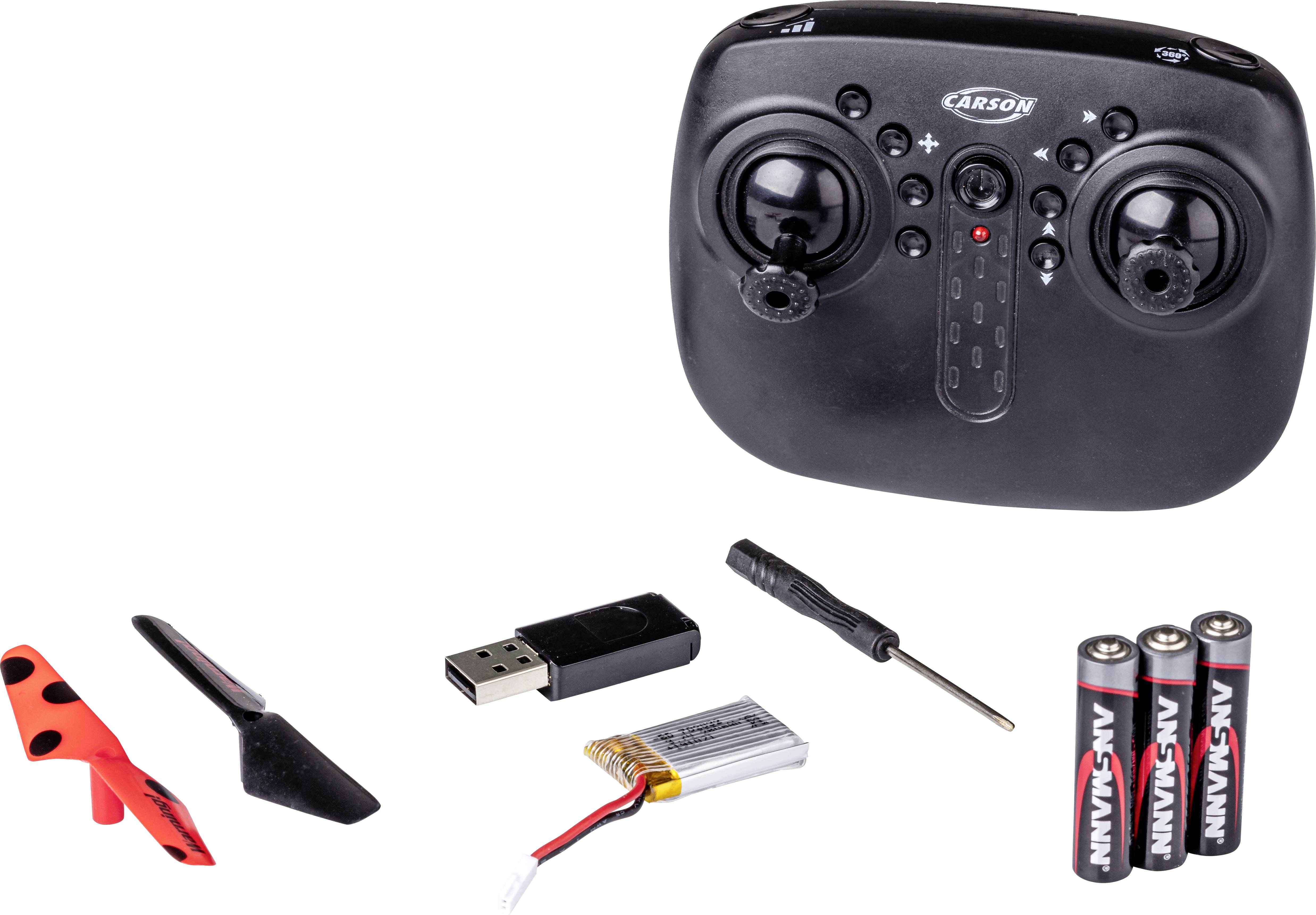 Afstandsbediening met twee stuursticks, daarnaast toebehoren: schroevendraaier, USB-lader, batterij, propeller, reserveonderdelen.