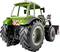 Groene tractor met grote banden en een voorlader aan de voorkant. Op de achtergrond zijn geen verdere details zichtbaar.