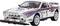Speelgoedauto in rallystijl, Lancia-wagen met 'Martini'-sponsoring, rallystrepen, en koplampen. Race-ontwerpelementen.