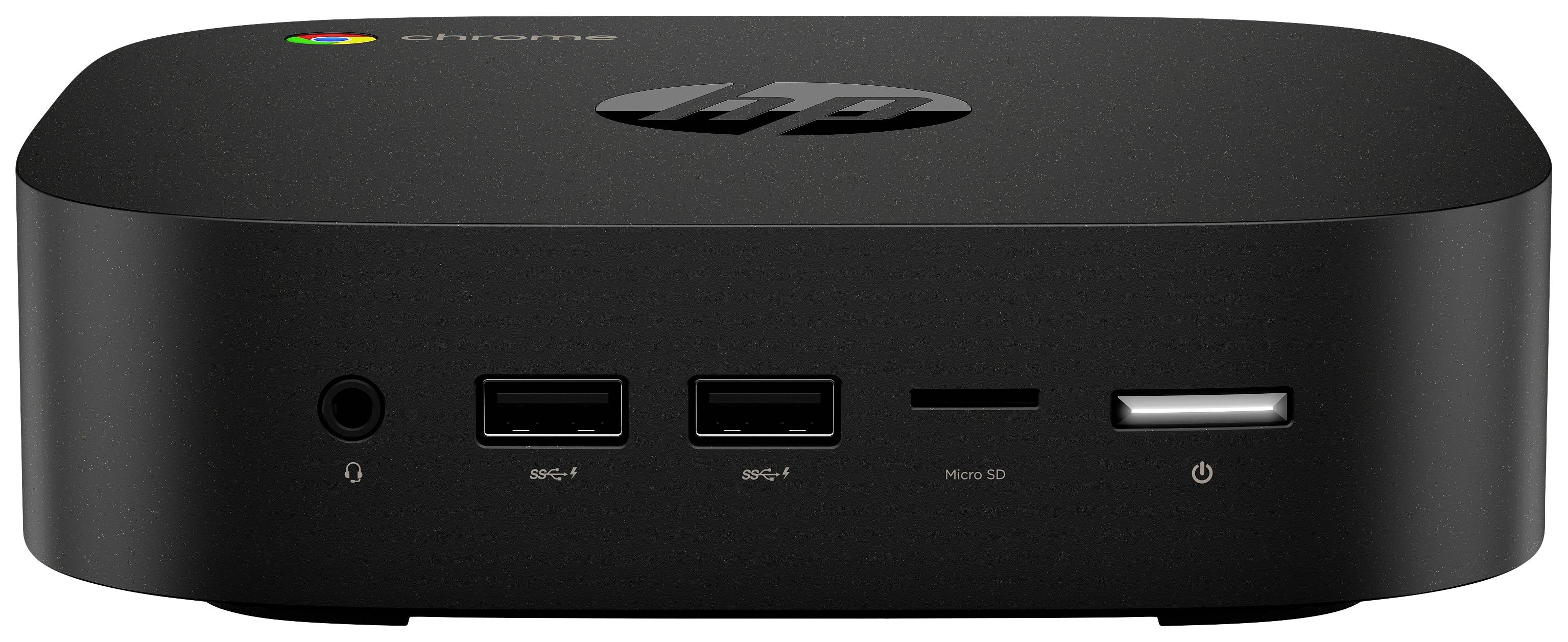 Een zwarte HP Chromebook Mini-PC met aansluitingen: twee USB-poorten, een micro-SD-kaartlezer, een koptelefoonaansluiting en een netschakelaar.