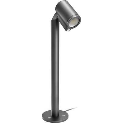 Een zwarte staande lamp met een cilindrische lampenkop en een rond voetstuk, gericht op het verspreiden van gericht licht.