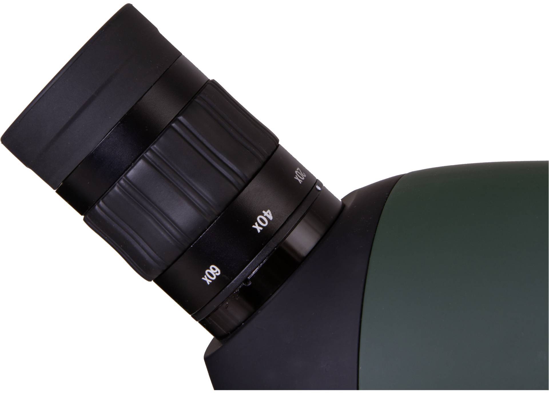 Een groen telescoop-oculair met zoomstanden van '20x', '40x', '60x' op een zwart scherpstelwiel dat schuin staat.