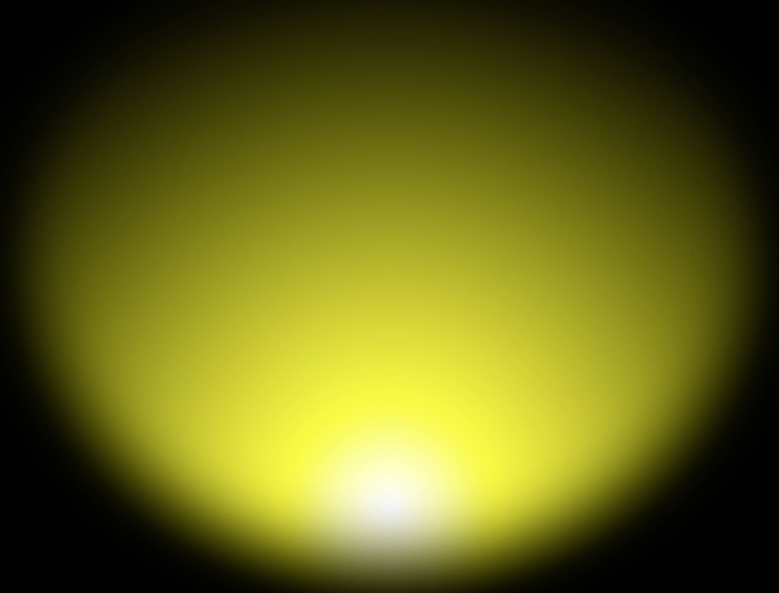 Onscherpe kleurovergang met een geel centrum dat overloopt naar zwart. Abstract, stralend lichtpatroon zonder specifieke details.