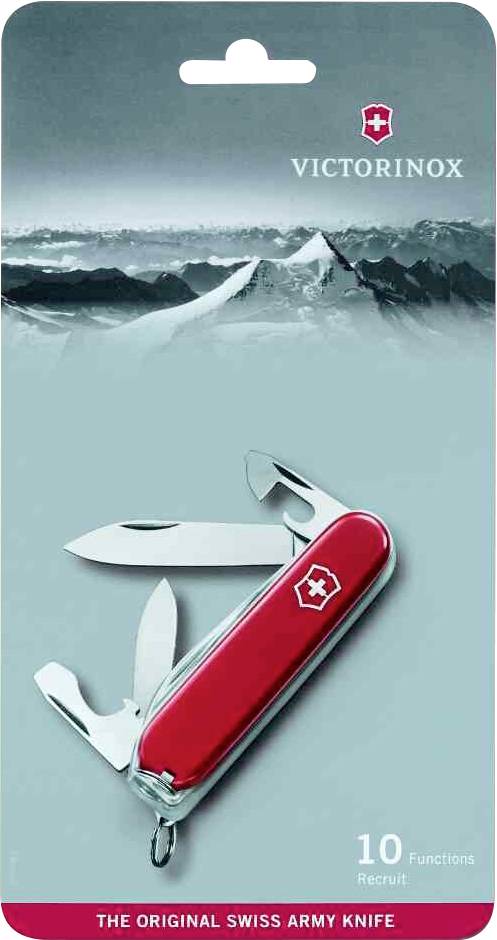 'Zakmes van Victorinox met rode handgreep en meerdere gereedschappen, verpakt op een kartonnen kaart met berglandschap op de achtergrond.'