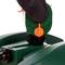 Groen apparaat met een oranje draaiknop en een zwarte hendel, waarschijnlijk een instelling of besturing.