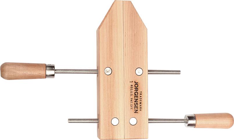 Houten klem met twee schroefgrepen, gebruikt voor het vastklemmen van werkstukken bij houtbewerkingen.