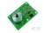 Groen elektronisch module met zilverkleurig rond onderdeel, gemonteerd op een kleine printplaat.