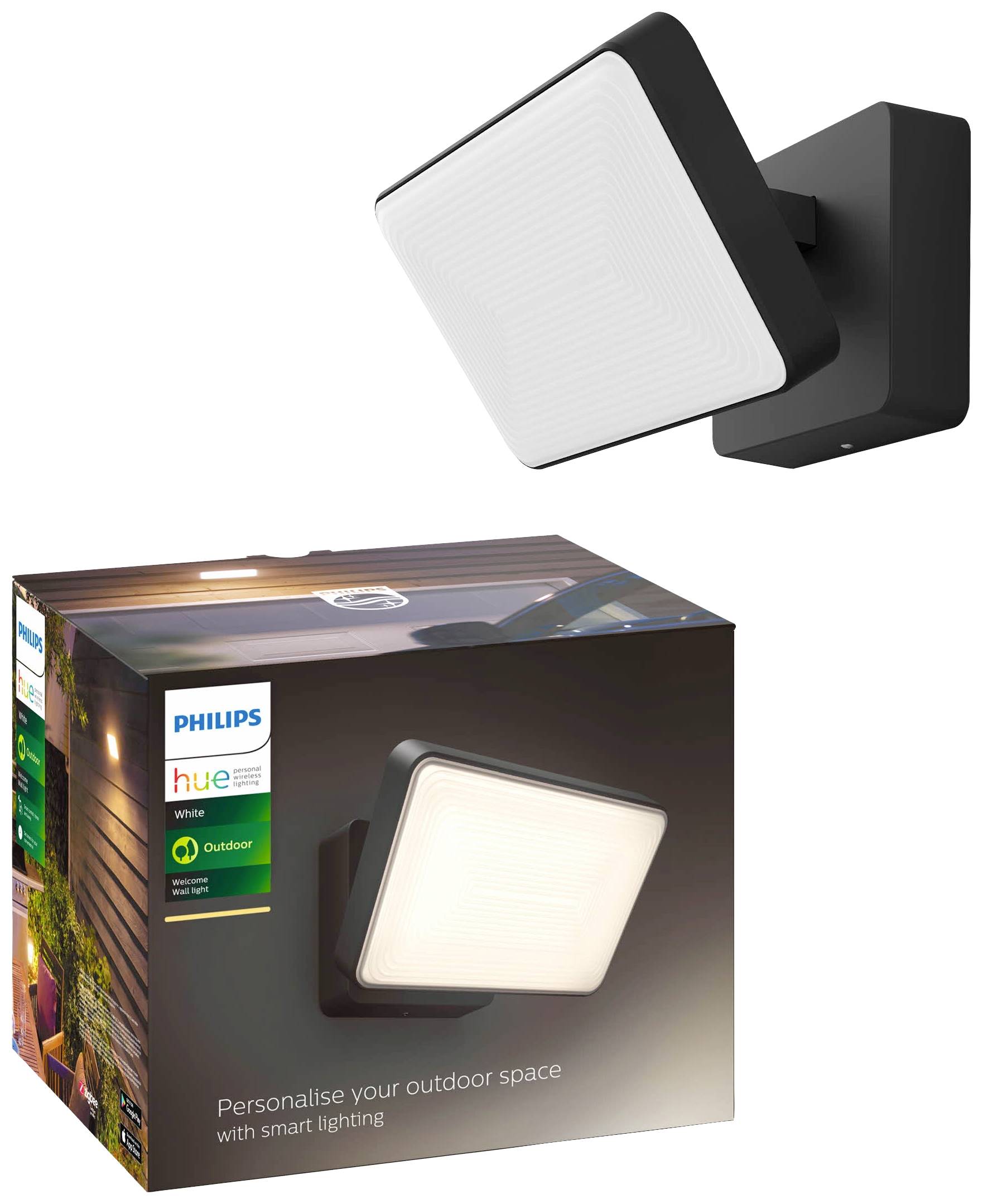Wandlamp en verpakking van de Philips Hue buitenlamp. De lamp heeft een vierkant design en biedt slimme verlichtingsopties.