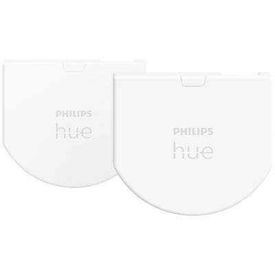 Twee witte Philips Hue Smart Plugs.