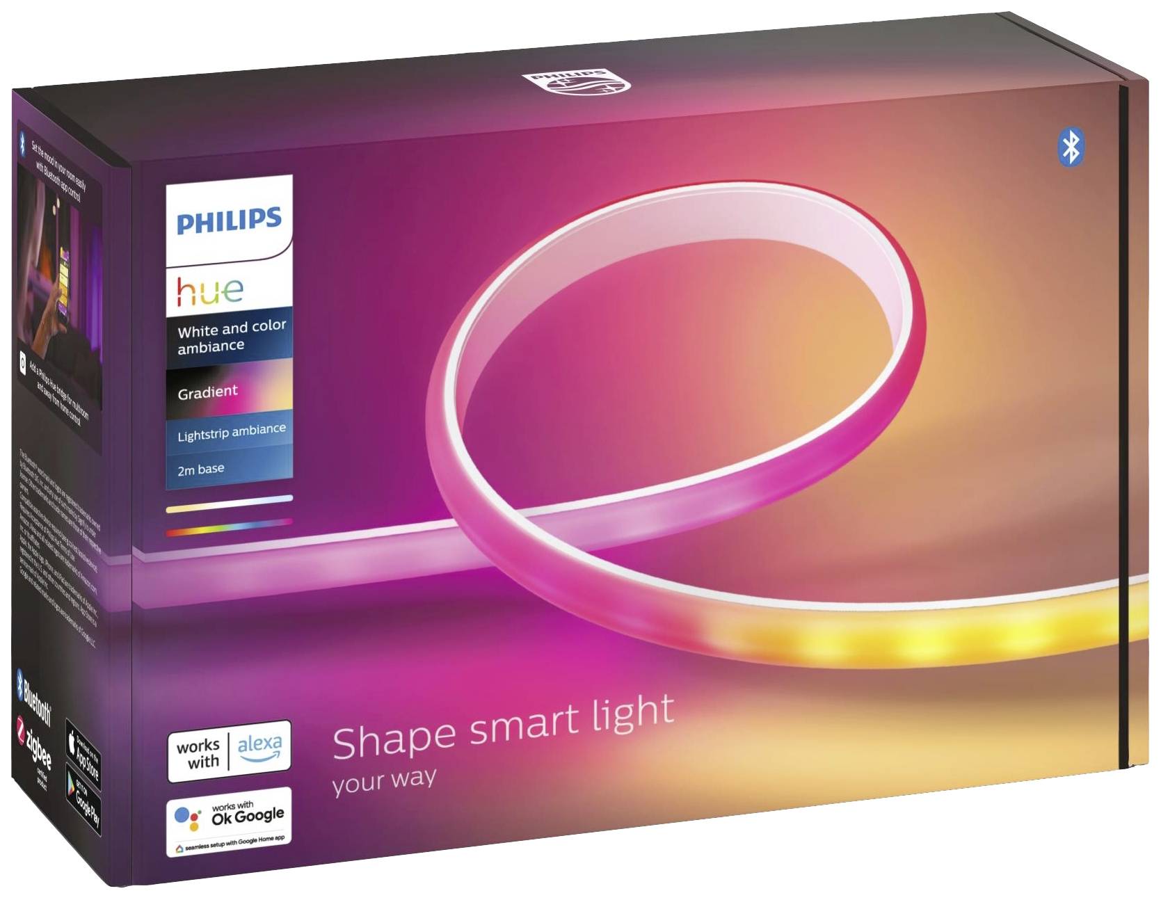 Verpakking van de Philips Hue Gradient Lightstrip, toont kleurrijke lichtgradiënt. Compatibiliteit met Alexa en Google Assistant aangegeven.