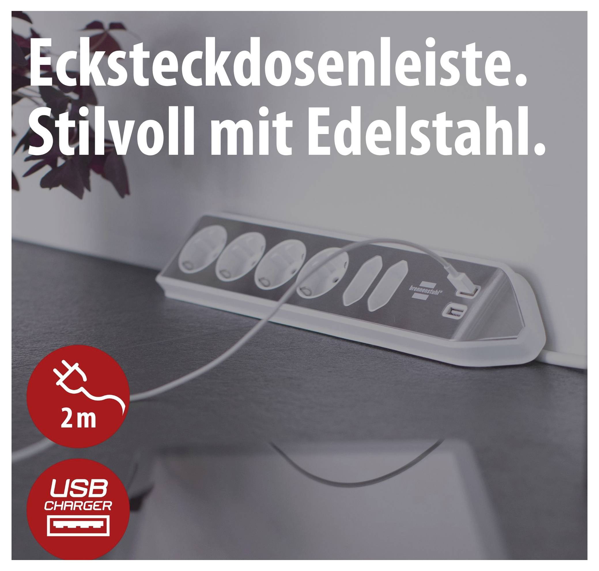 Stekkerdoos van roestvrij staal met meerdere stopcontacten en USB-laadaansluiting; tekst: 'Stekkerdoos. Stijlvol met roestvrij staal.'