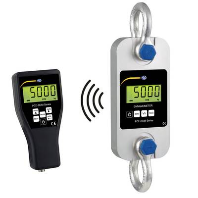 Draadloos digitaal dynamometersysteem met handheld afstandsbediening en meetcel beide aangeven 5000 STG kg, met signaalicoon dat draadloze communicatie aangeeft.