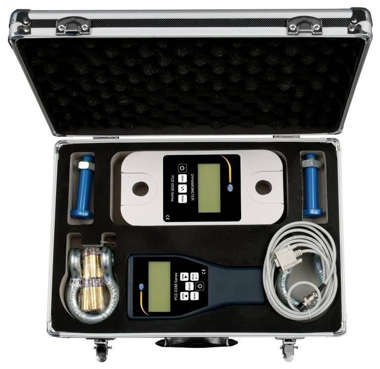 Opentas met draaggreep bevattende twee handheld elektronische apparaten, twee blauwe sondes, opgerold snoer en adapters in schuimstof-inzetstuk.