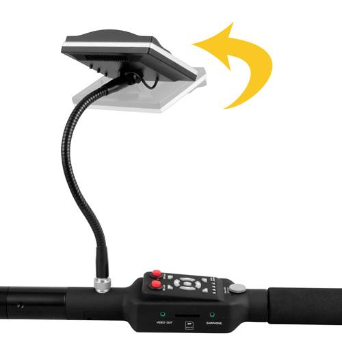 Een draagbare videovergroter met scherm, waarbij het drukken van de rode toets naar rechts het beeld draait. Contrastregeling aanwezig.